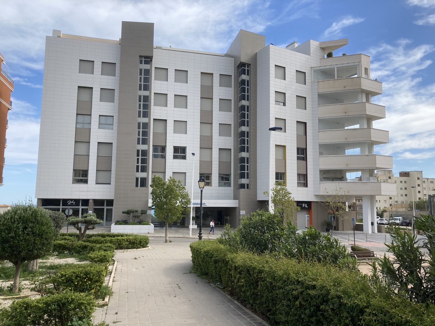 Panorama Suites seen from the garden side, six floors in white stone
